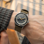 1956 Marine Steel Black Gilt, caseback view