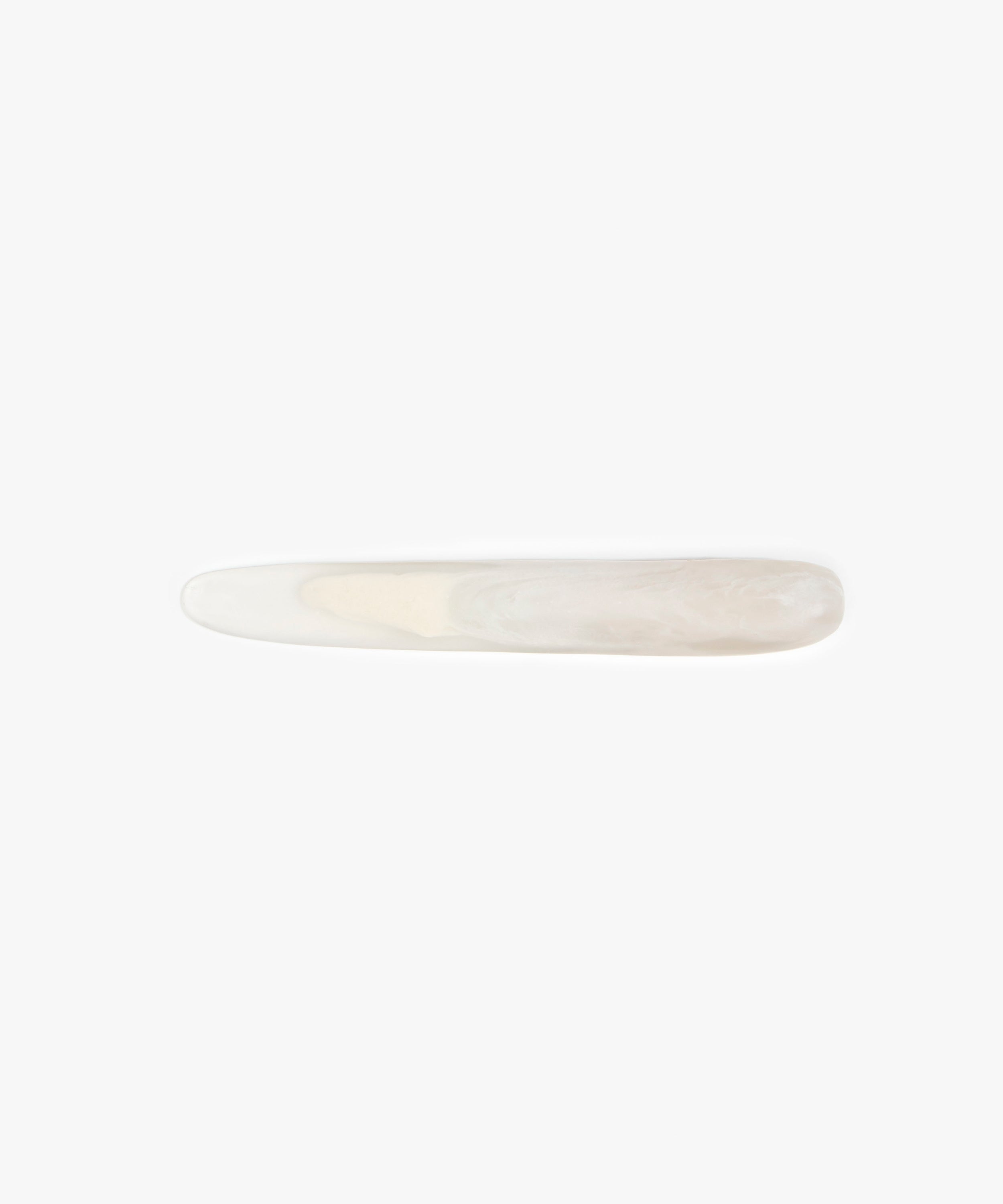 Stone Cheese Knife in Chalk Swirl by Dinosaur Designs, hand-cast resin