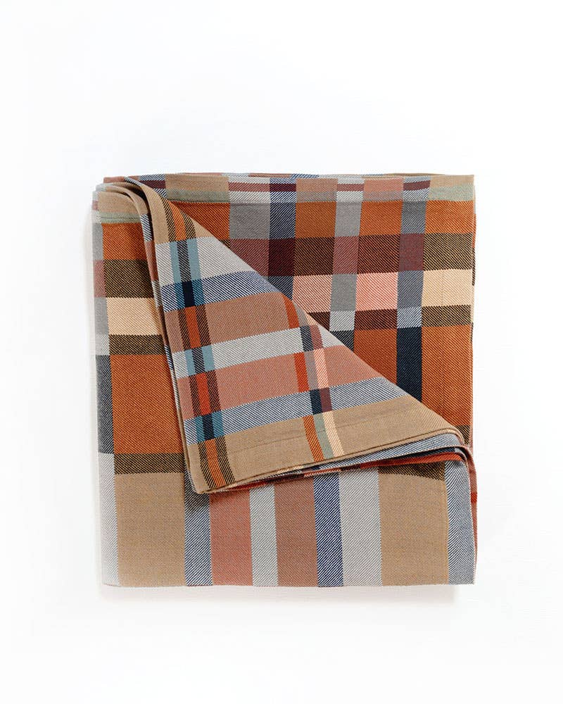 Mungo Double Cloth Queen Blanket in Karoo, folded to show both faces of the reversible weave