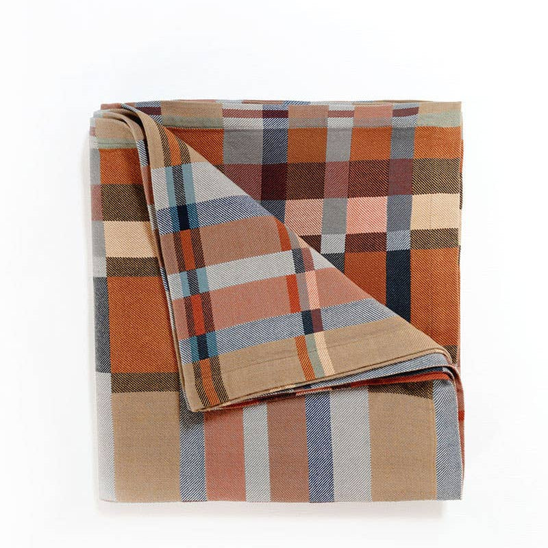 Mungo Double Cloth Queen Blanket in Karoo, folded to show both faces of the reversible weave