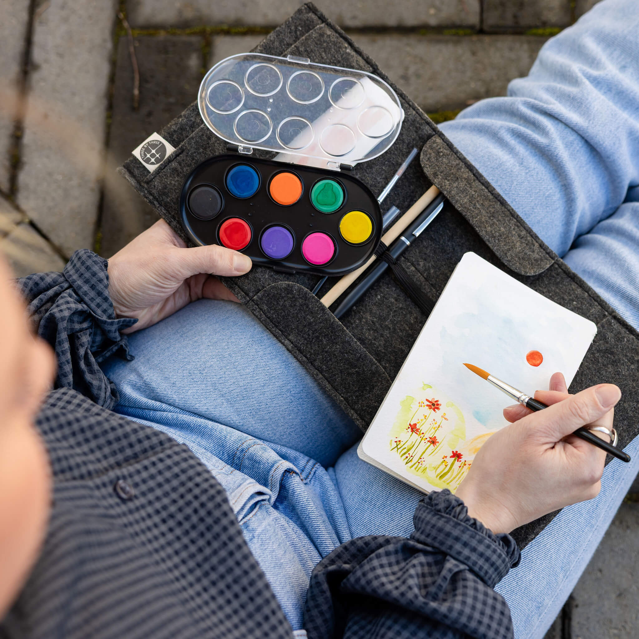 Jotblock Travel Postcard Watercolor Paint Set in use outdoors