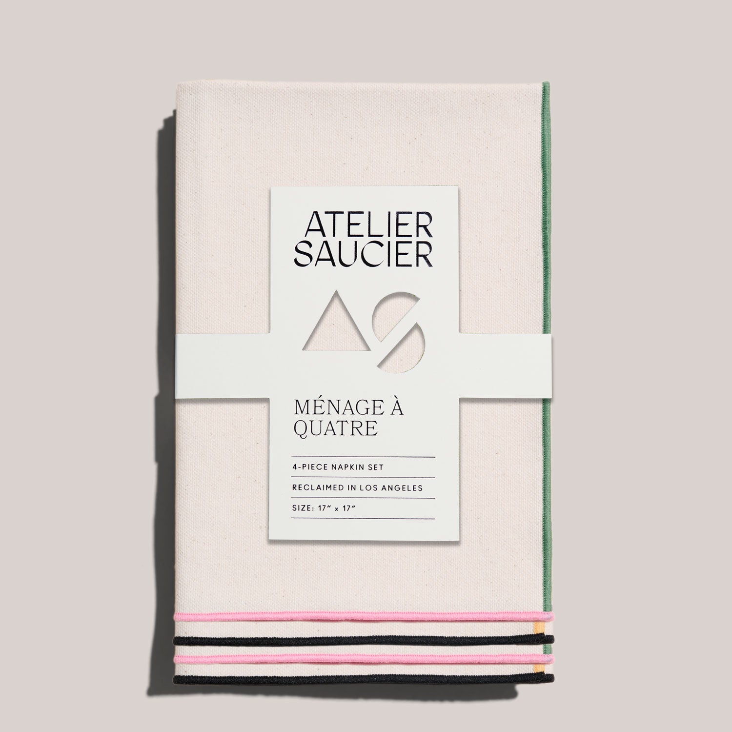 ATELIERSAUCIERDinnerNapkinsinMacawBurlapWhiteBackground.jpg