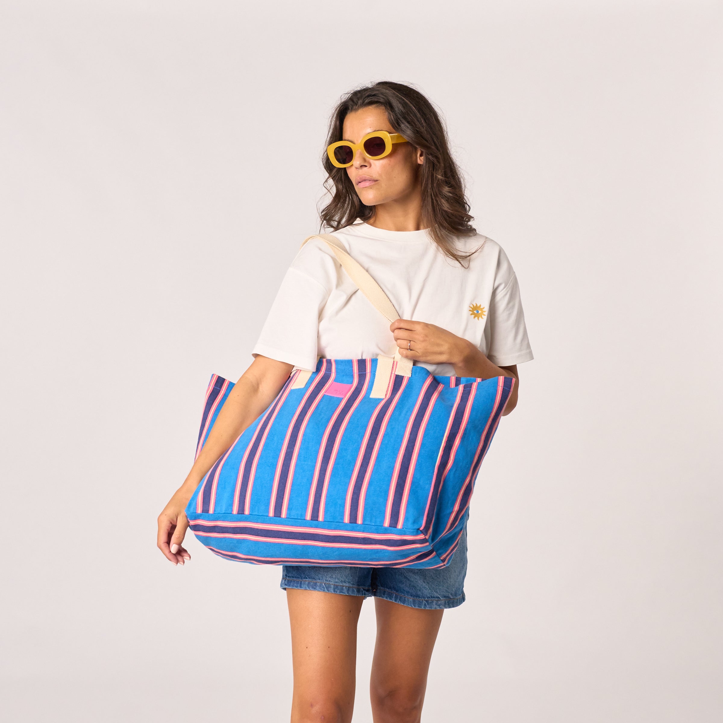 Striped Tote Bag - Blue, worn on shoulder