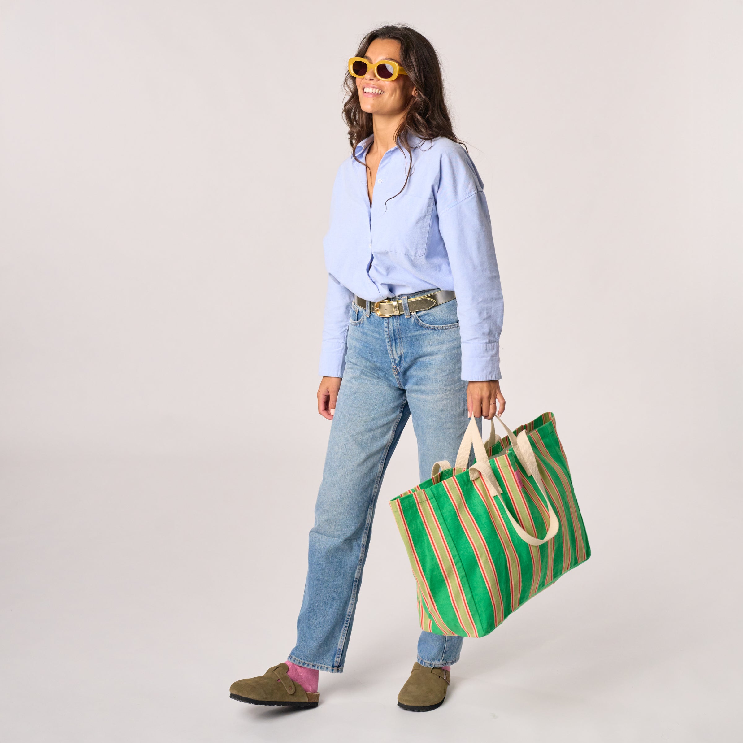 Striped Tote Bag - Green, worn on shoulder
