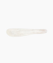 Temple Cake Knife in Chalk Swirl by Dinosaur Designs, hand-cast resin