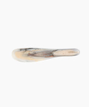 Temple Cake Knife in Sandy Pearl by Dinosaur Designs, hand-cast resin