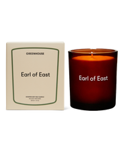Earl of East Greenhouse candle in amber glass with its boxed sleeve