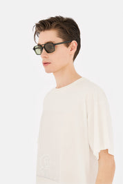 Model wearing Lunettes 7 in Green