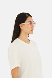 Model wearing Lunettes 4 in Pearl Sand, side view