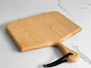 Norr Board in Maple shown at an angle, flat view