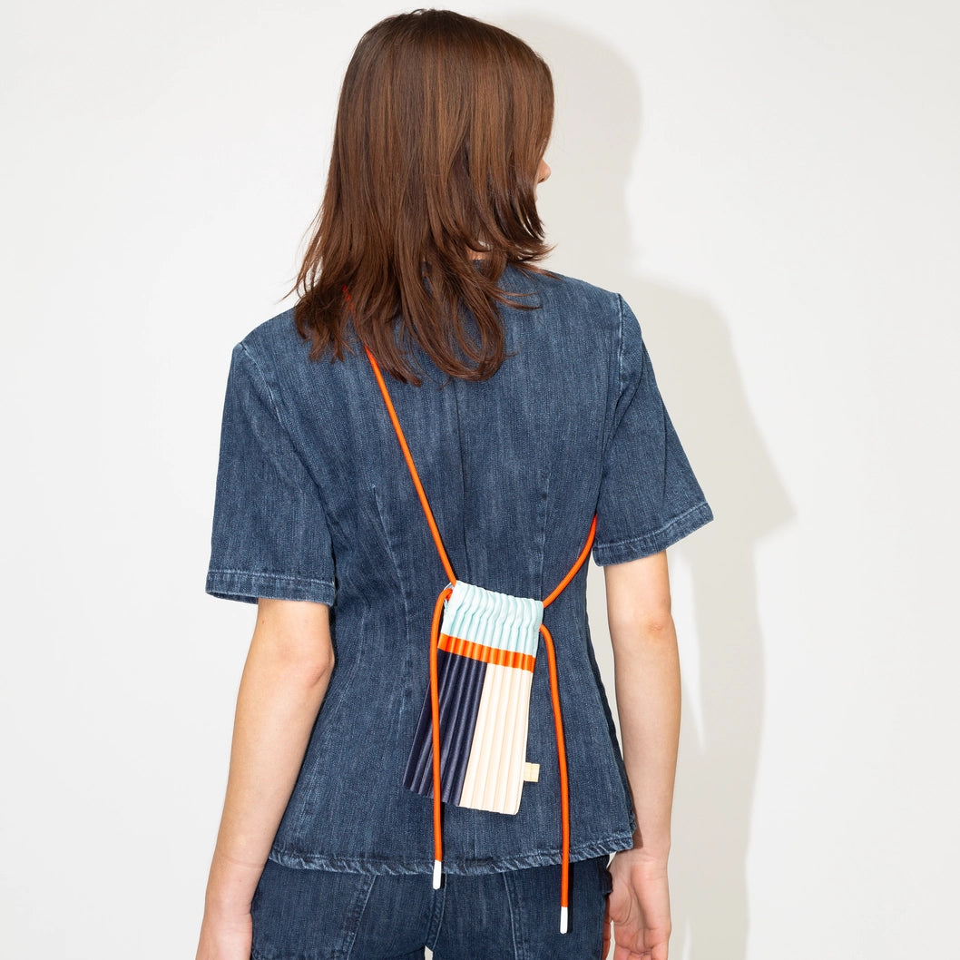 MultitudesMiniPleatedBagBlueModel.webp