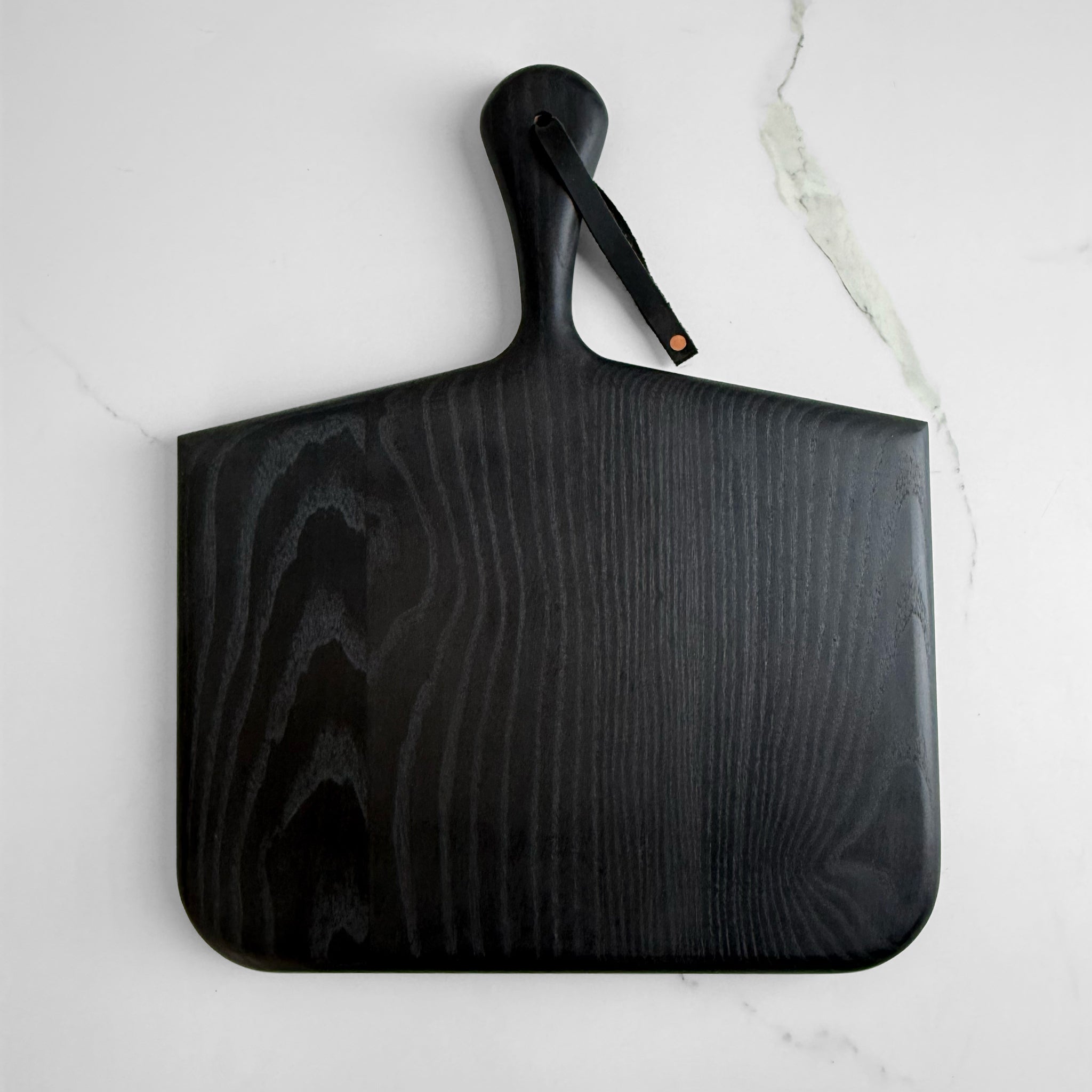 Norr Board in ebonized ash by KHEM Studios, matte black serving board