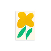 Moglea Oxalis pad, a yellow four-petal flower with green leaves riso printed on cream