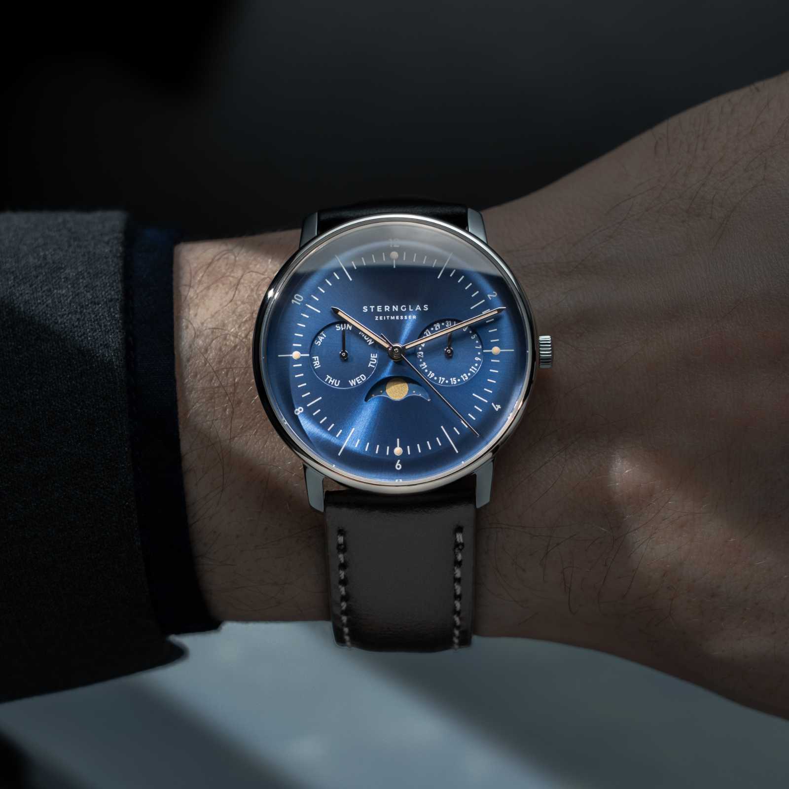 Detail of the Naos Moonphase dial showing the moonphase and calendar displays