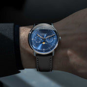 Detail of the Naos Moonphase dial showing the moonphase and calendar displays