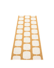 Pappelina STEN rug in Ochre