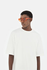 Model wearing Amata Estate in Mandarino, side view