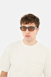 Model wearing Ra in Black Cat, side view