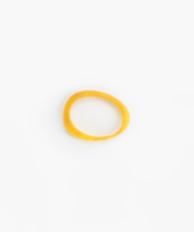 Rock Wishbone Bangle Narrow in Honeycomb by Dinosaur Designs, hand-cast resin