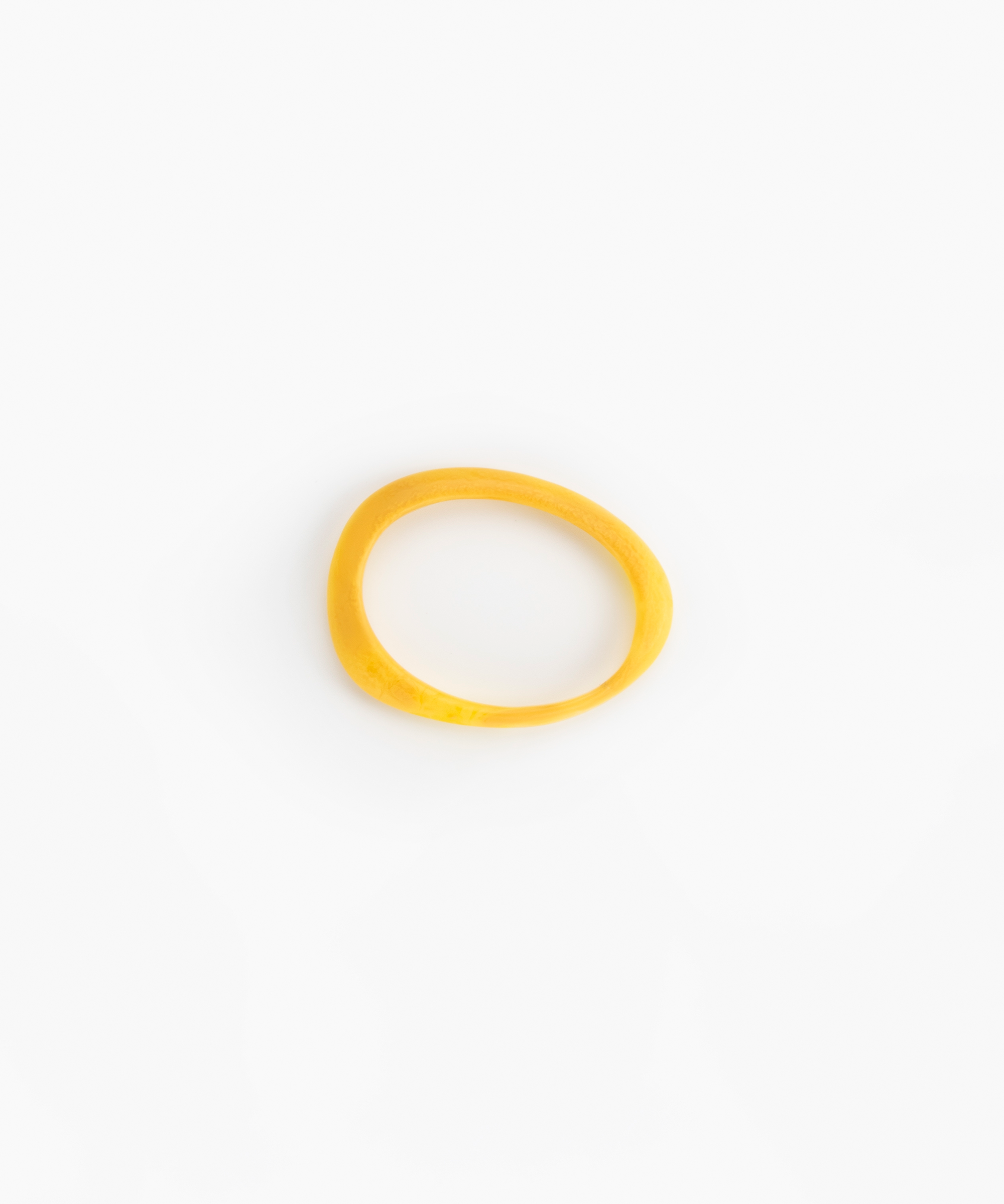 Rock Wishbone Bangle Narrow in Honeycomb by Dinosaur Designs, hand-cast resin