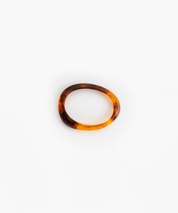 Rock Wishbone Bangle Narrow in Tortoise by Dinosaur Designs, hand-cast resin