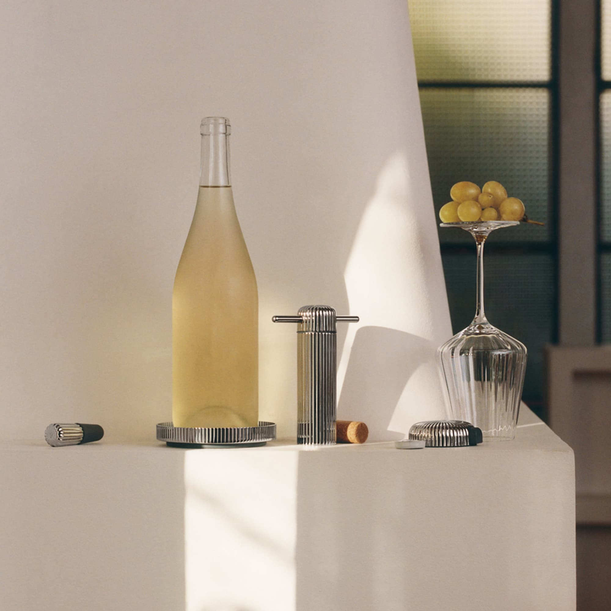 Bernadotte Wine Coaster styled on a table