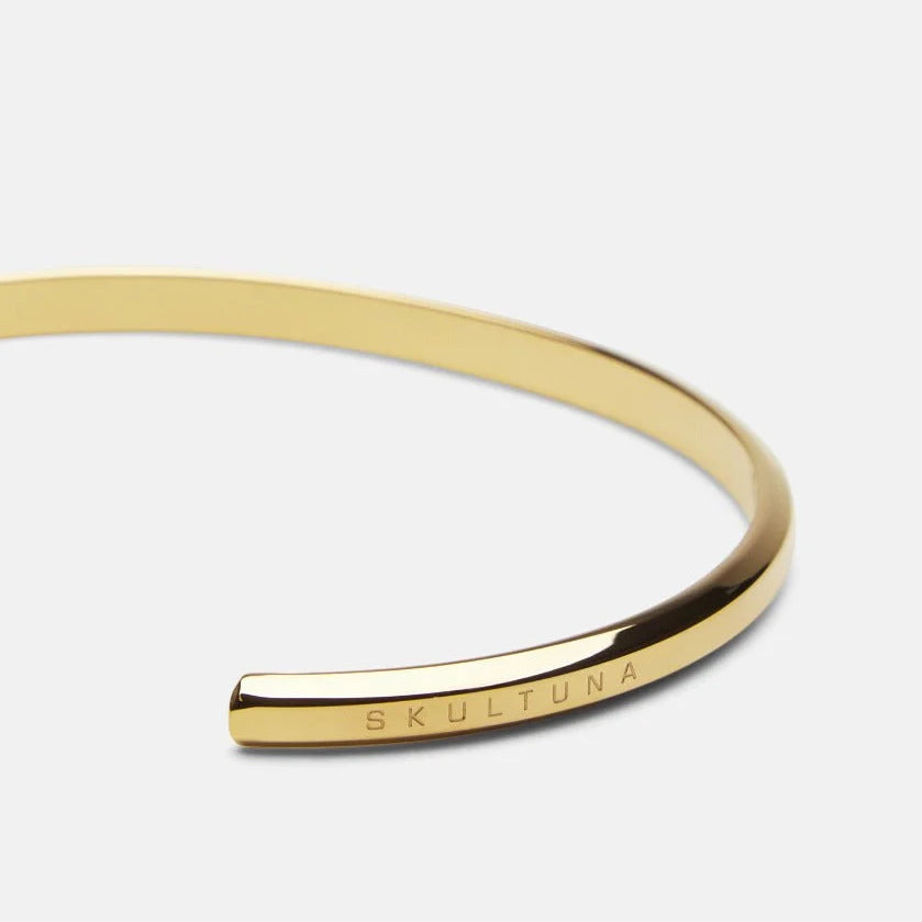 Skultuna_ThinIconCuff_Gold_2.webp