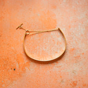 So Niice Bridge Bracelet, a gold-filled cuff style bracelet with toggle clasp
