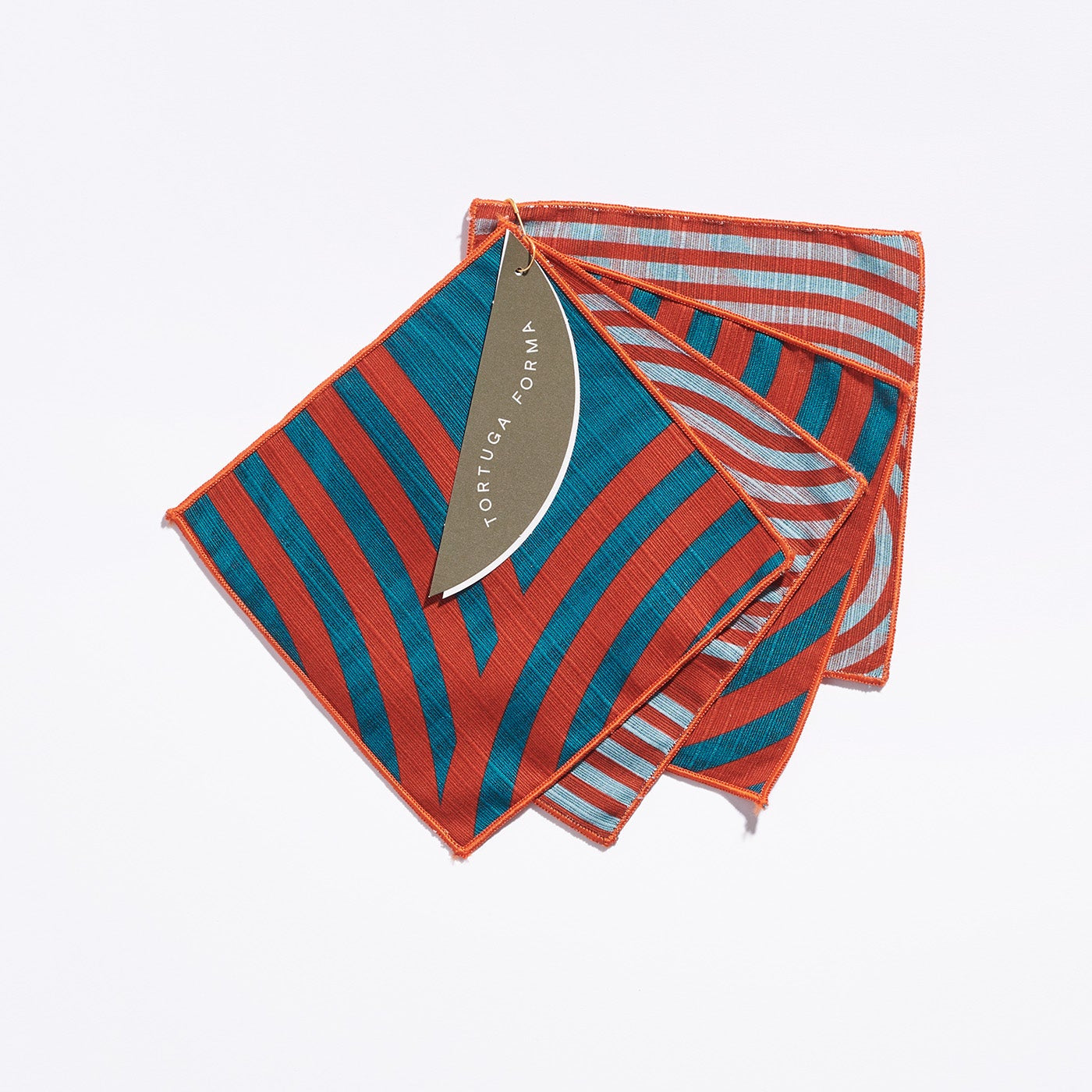 Comb Cocktail Napkins in Garnet, stacked