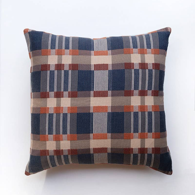 Mungo Skipping Block Cushion in Marbles, a navy, rust and cream Monk's Belt weave