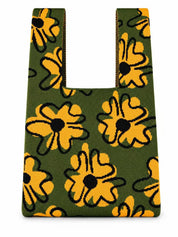 Knitted tote bag with oversized golden yellow flowers on a moss green background
