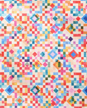 Close-up of the Patchwork Geo print, small watercolour squares and diamonds in red, blue, pink and green