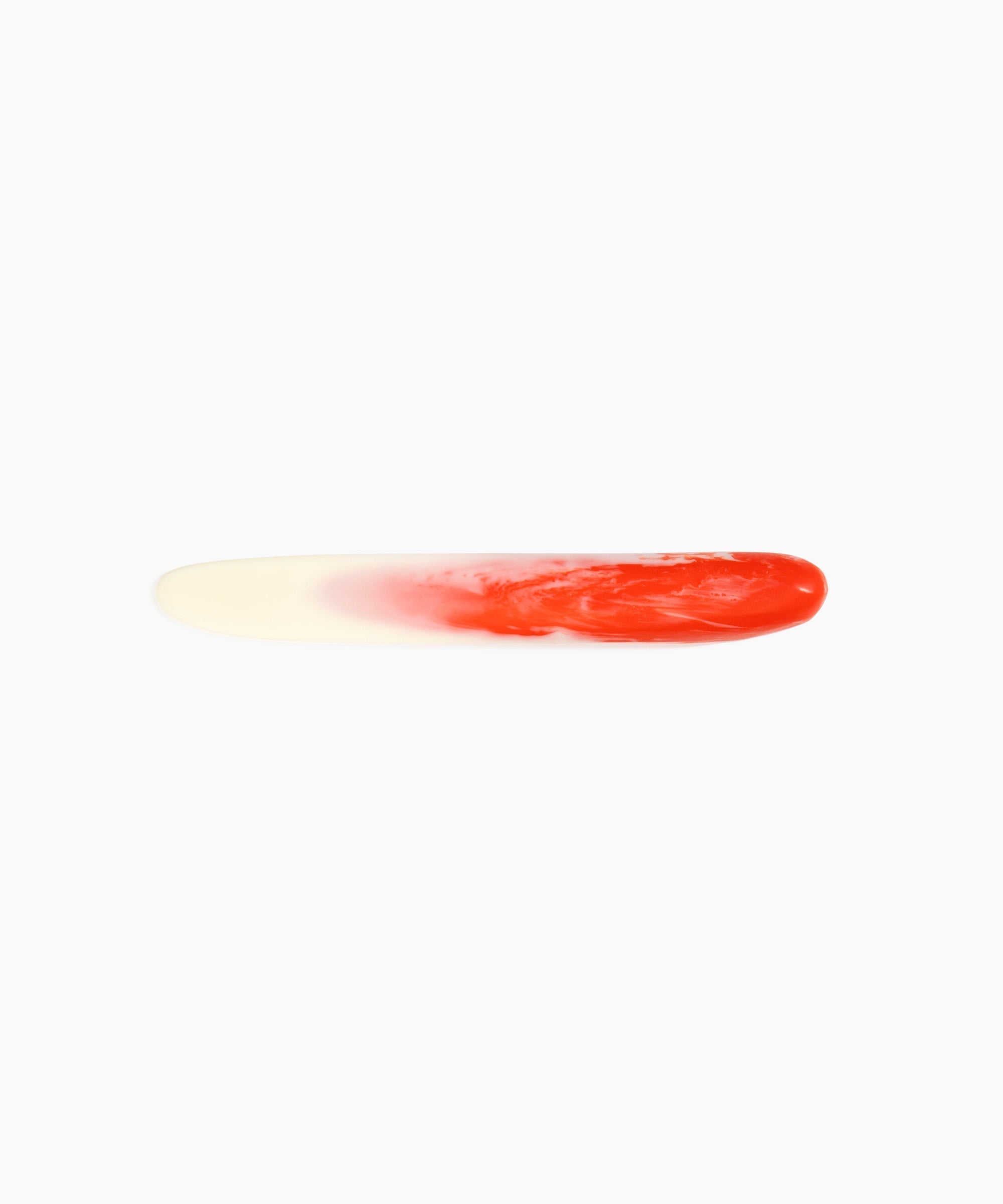 Stone Cheese Knife in Strawberry by Dinosaur Designs, hand-cast resin