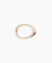 Rock Wishbone Bangle Wide in Sandy Pearl by Dinosaur Designs, hand-cast resin