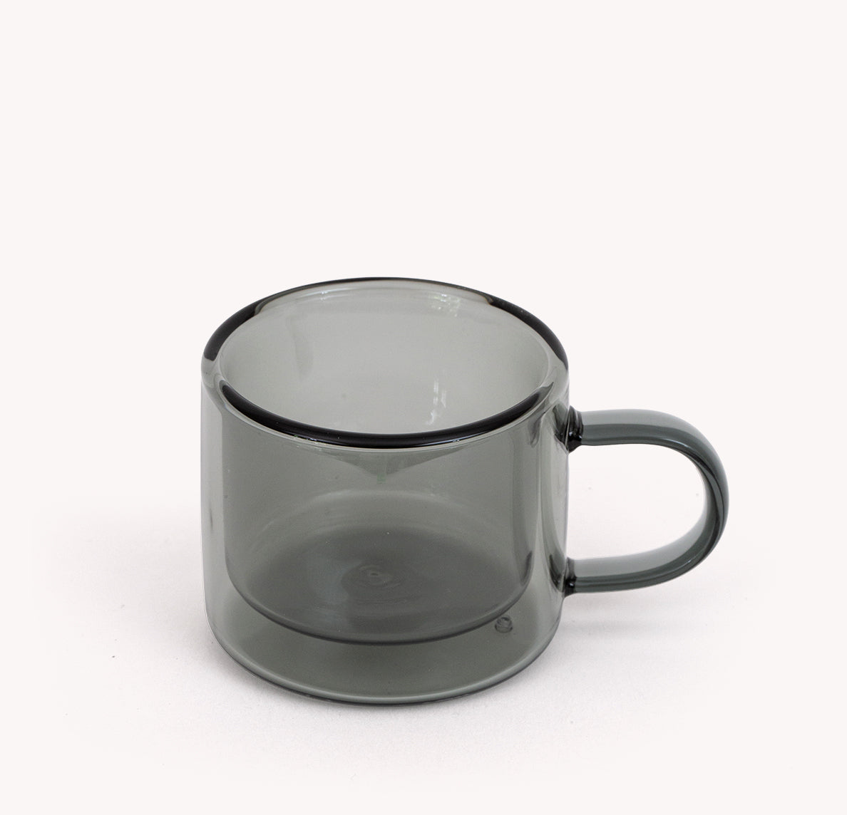 Gry Mattr double-walled espresso cup in smoke gray borosilicate glass with a curved handle