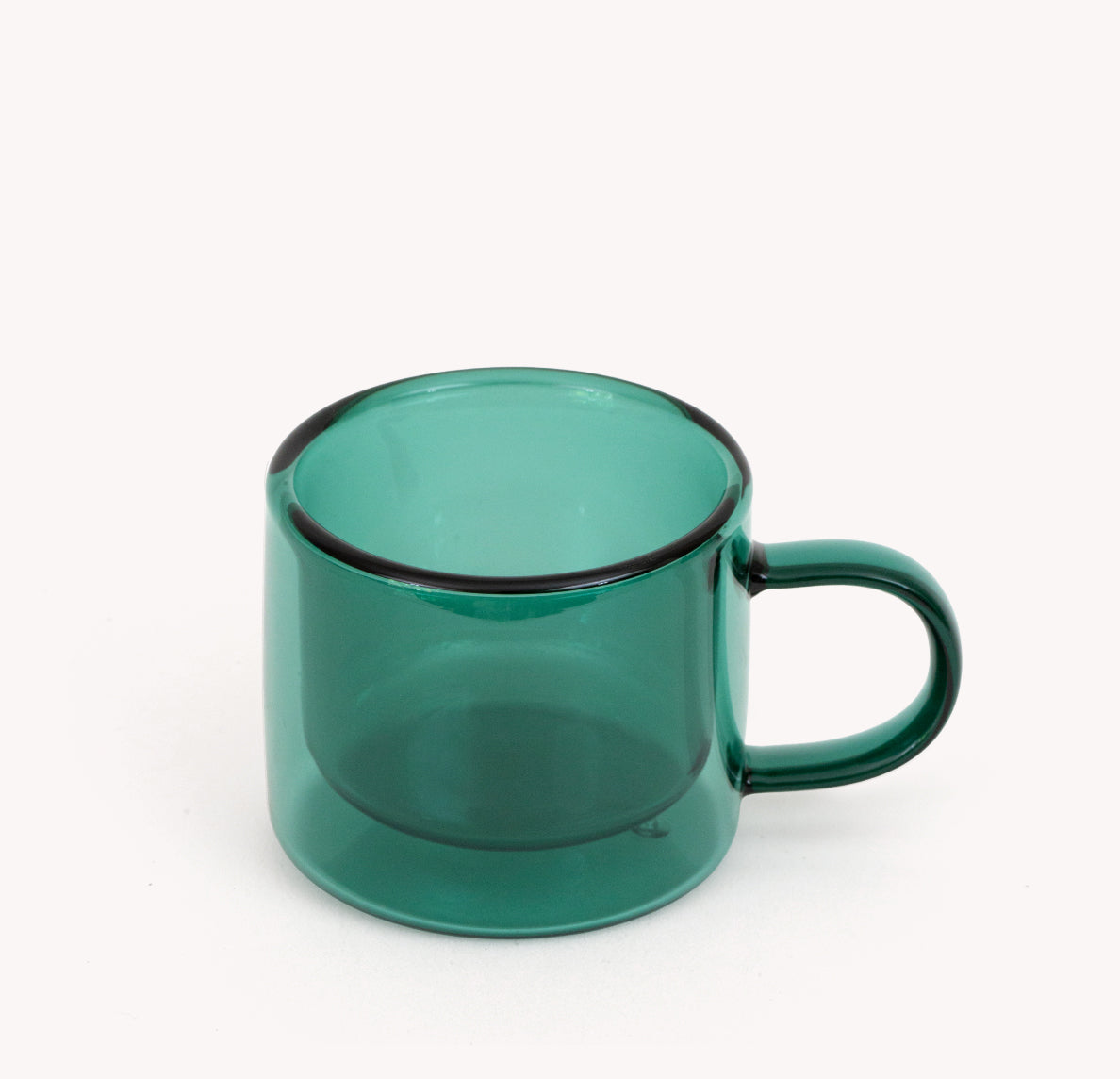 Gry Mattr double-walled espresso cup in forest green borosilicate glass with a curved handle
