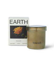 Homework Earth candle, 180g amber glass vessel with its printed box