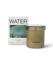Homework Water candle, 180g amber glass vessel with its printed box