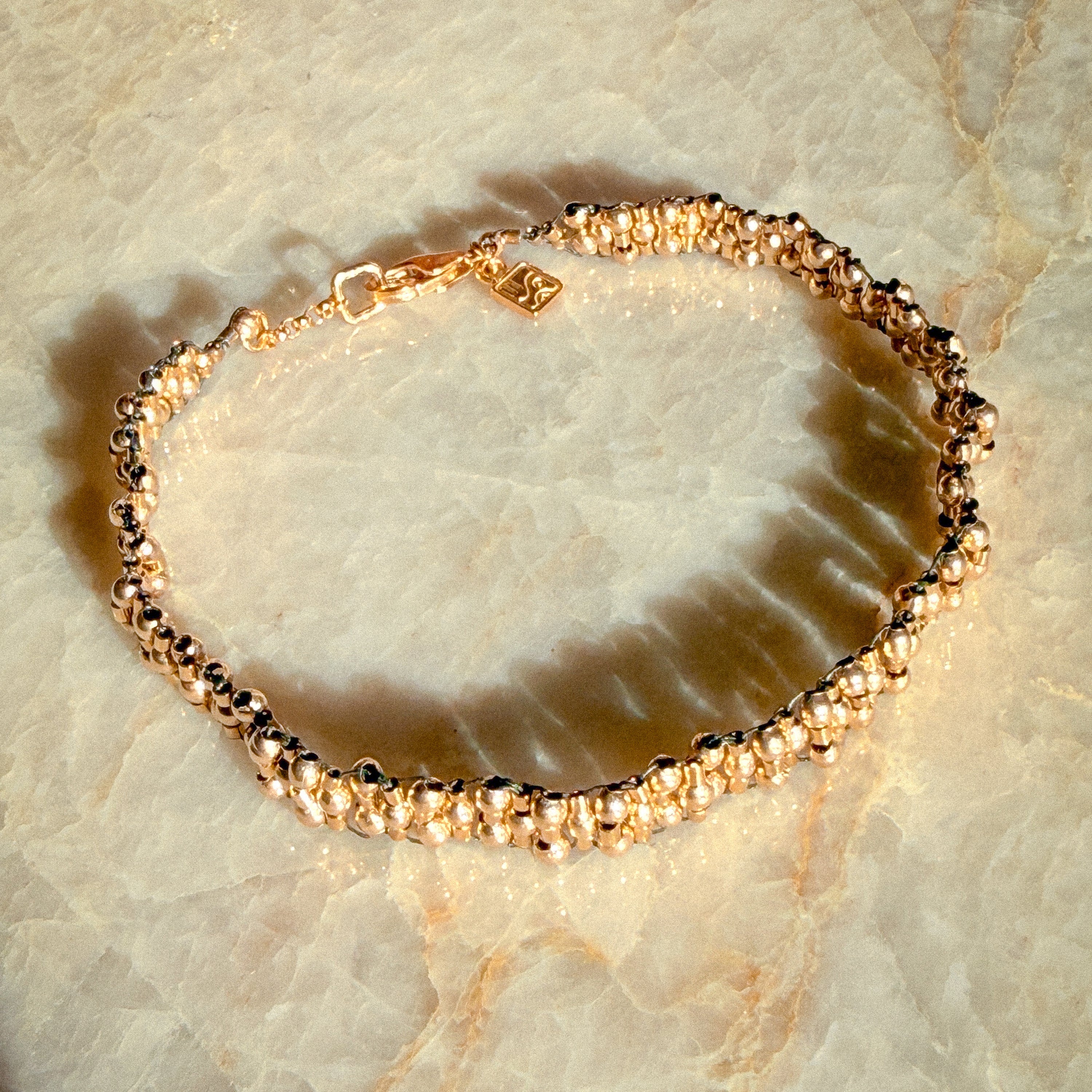 So Niice Recuerdo Bracelet, hand-woven in 14k gold-filled materials
